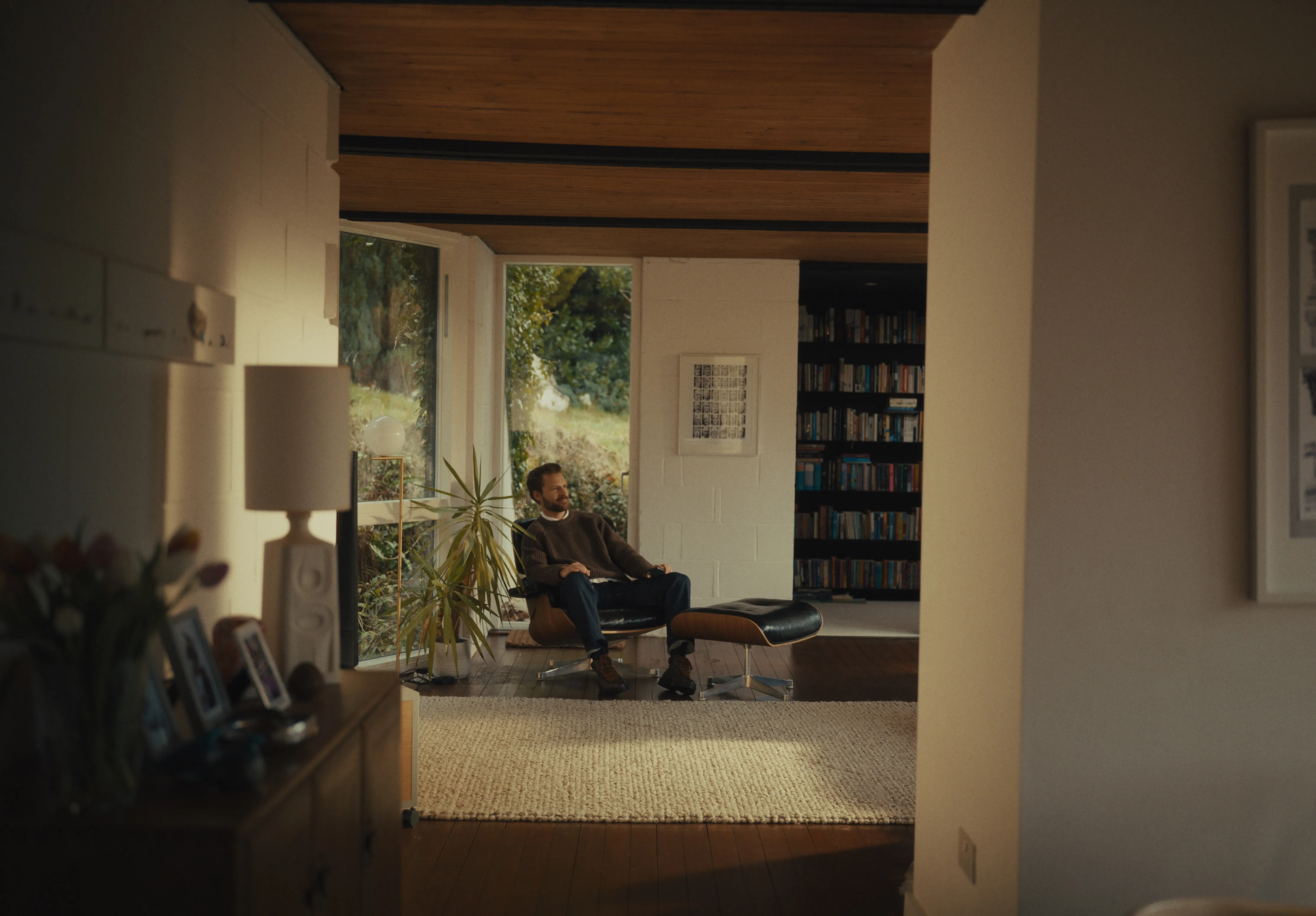 A person enjoying a moment of calm in a modern home.